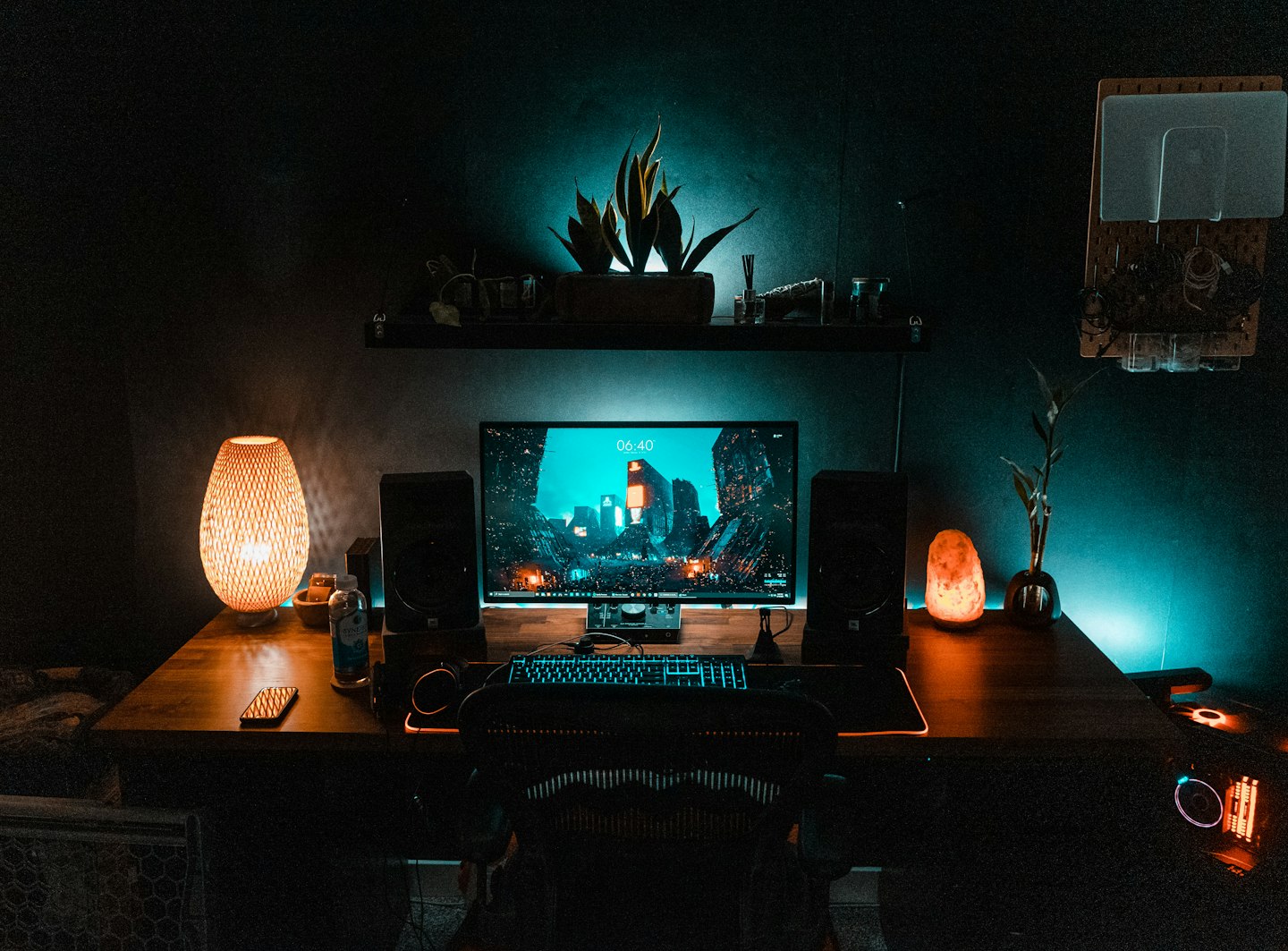 A creator workspace with a monitor, drawing tablet, and clean desk setup for digital art.