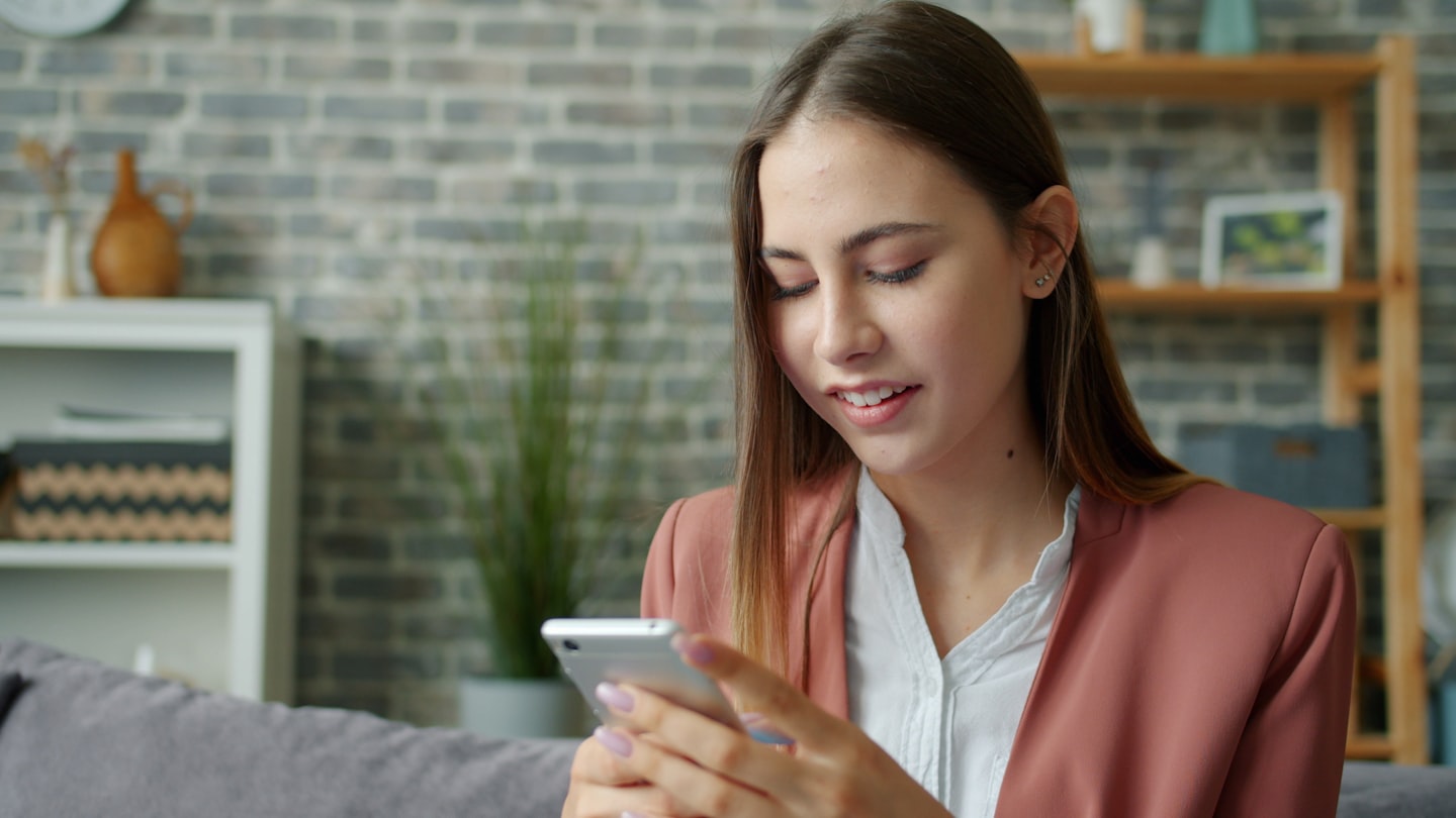 Close-up of smartphone privacy settings for checking adult chat app moderation and account controls