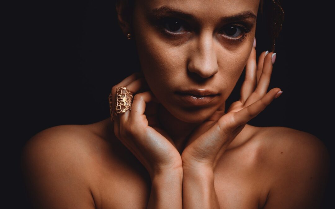 Photorealistic glamour portrait of a young adult creator in a ring light studio, suggesting a modern path into the porn industry.