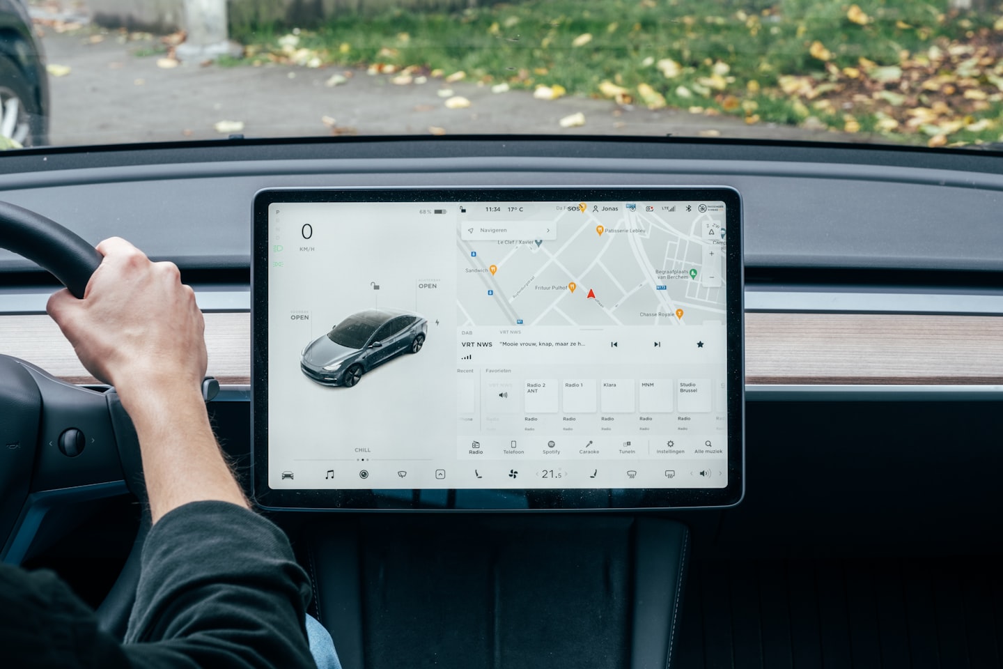 Close view of a monitor showing a modern dashboard interface for comparing platform features