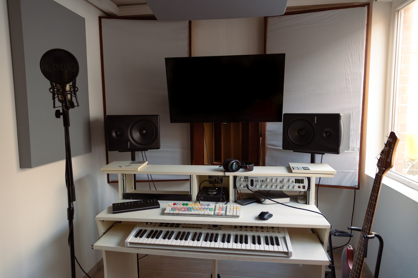 A stylish home studio setup for a creator or agency team choosing the right content monetization platform.