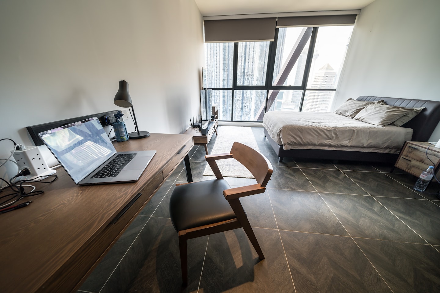 Creator bedroom workspace showing a private setup for online paid chats