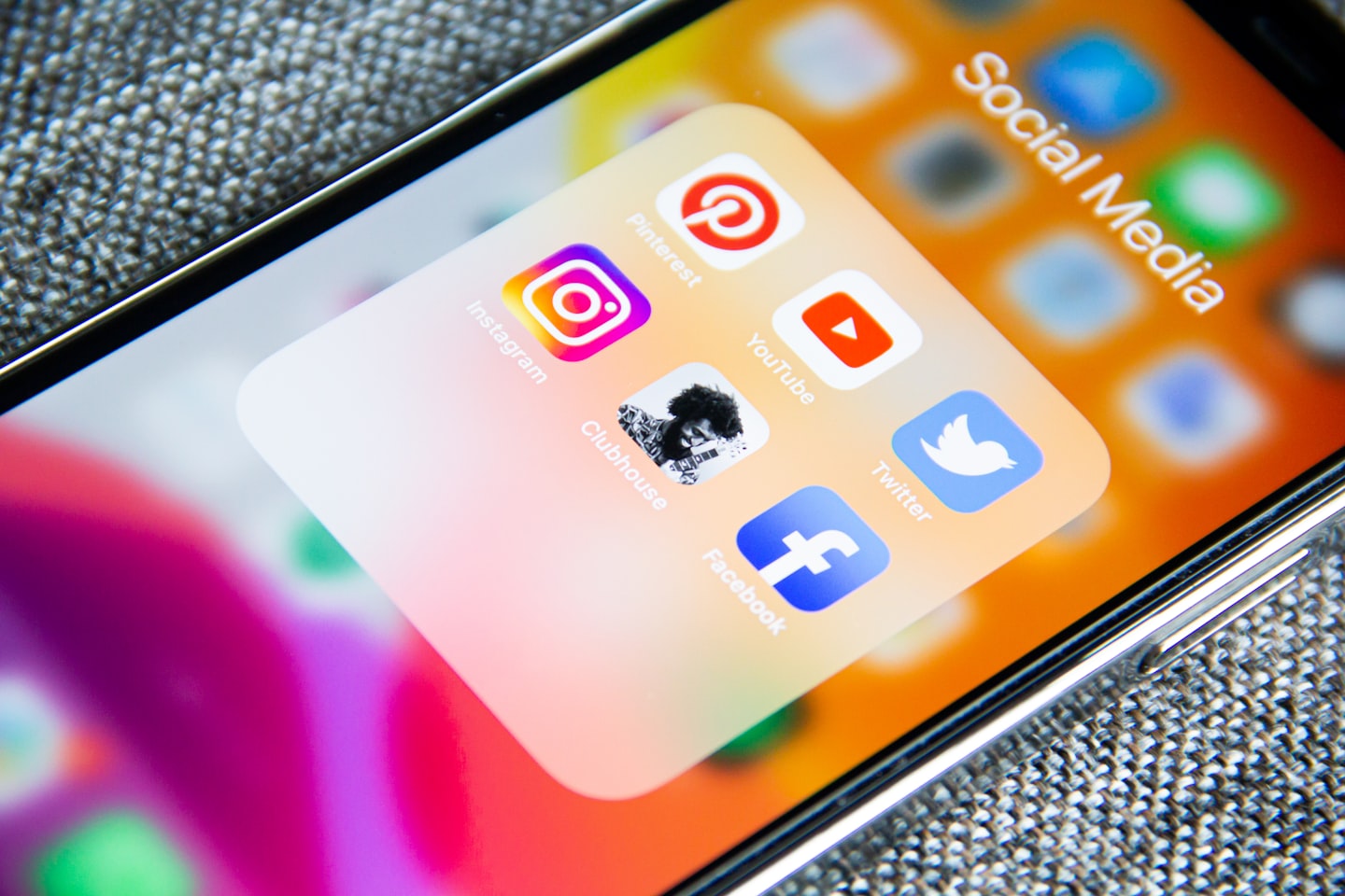 Social media content on a phone, representing how creators use hashtags to attract viewers from external platforms