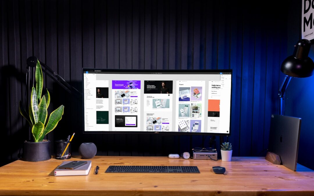 Creator at a modern workspace reviewing AI art selling options on a laptop and phone