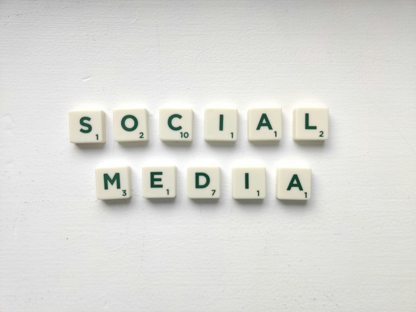 A social media feed on a smartphone showing how public discovery starts on Twitter and leads to creator traffic.
