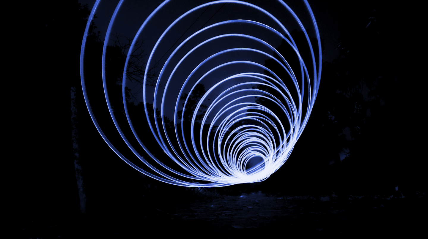 A creator filming premium content in a ring light setup for paid video offers