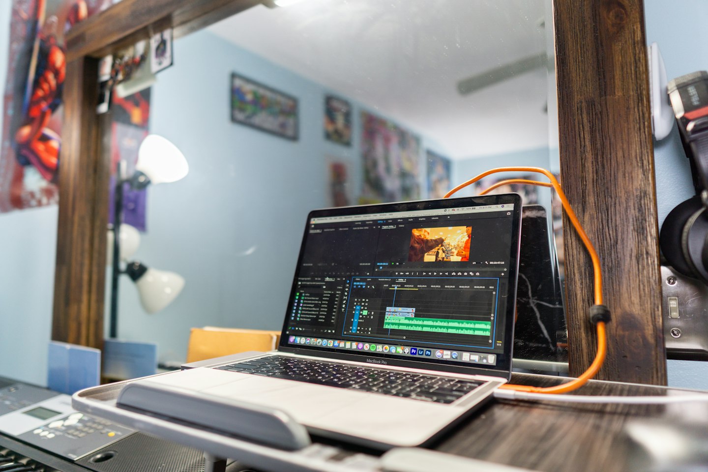 macbook pro on brown wooden table
