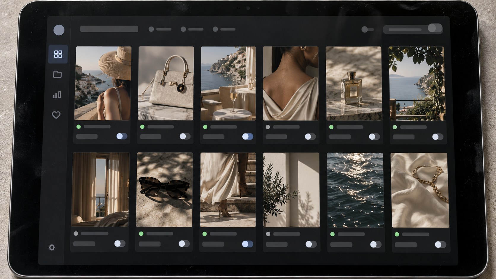 Close frontal view of an unbranded tablet displaying a campaign testing board with luxury fashion and travel image tiles